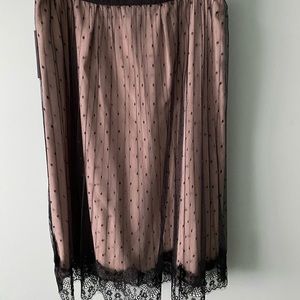 Nude skirt with sheer clack design